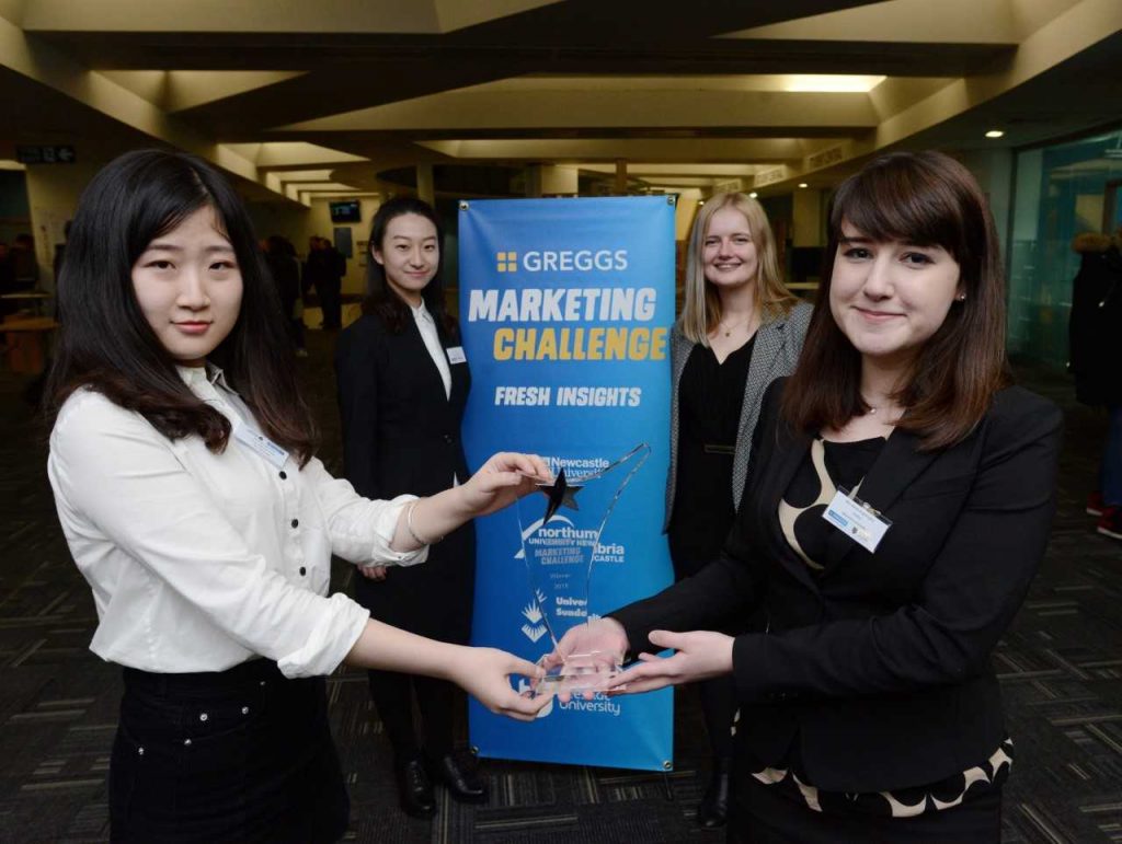 Newcastle University Students holding their award at the Greggs Marketing Challenge