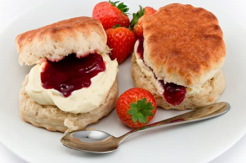 image of scone with cream and jam
